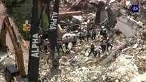 قتلى جراء انهيار مبنى سكني بفلوريدا وحريق بالموقع يعقد عمليات البحث