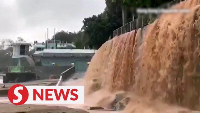 Black rainstorm floods Hong Kong roads