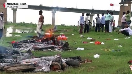 India's Covid graves exposed as Ganges river floods