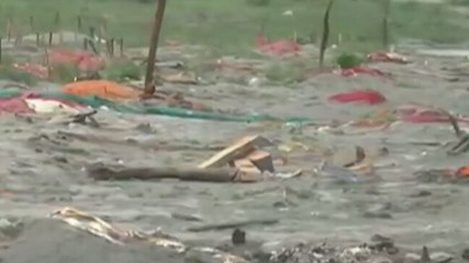Covid horror: Rains reveal graves on Ganga's banks in Prayagraj
