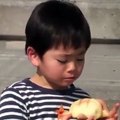 Crow Stealing Food From Little Boy