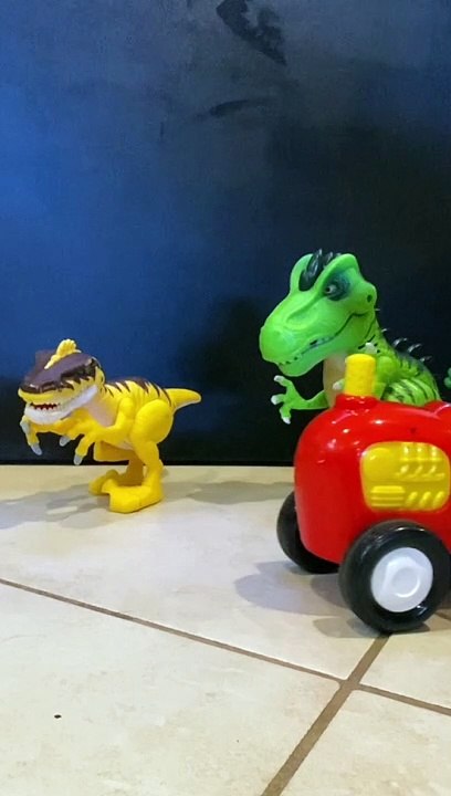Bearded Dragon Drives by on Toy Tractor