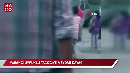 Video herunterladen: Kadının fotoğrafını çeken yabancı uyruklu şahsa sokak ortasında dayak