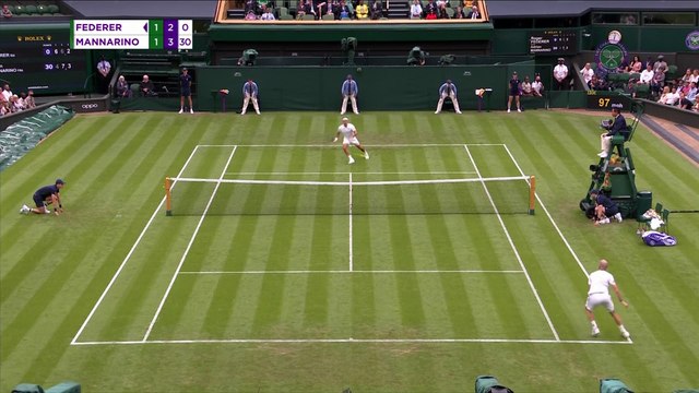Federer advances after Mannarino retires injured