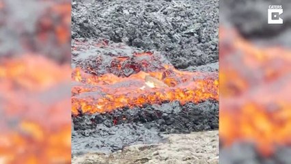 Stream Of Lava Consumes Large Boulder ( STONE )