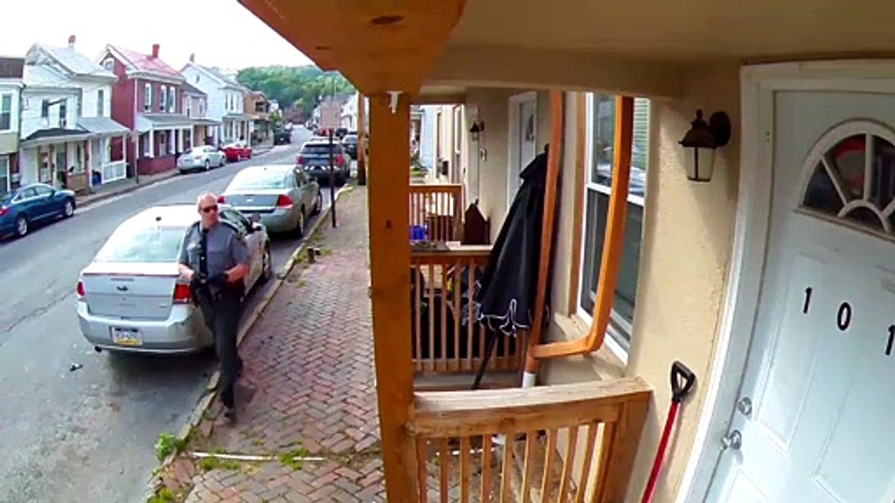 Police Officer Tapes Over Private Security Camera