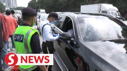 Descargar video: Enhanced MCO in Selangor: No barbed wire but more road blocks