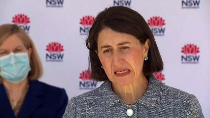 National cabinet agrees to halve international arrivals