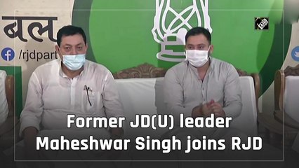 Former JD(U) leader Maheshwar Singh joins RJD