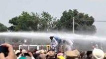 AAP workers protest outside Punjab CM's house, water cannons used
