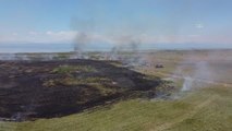 Beyşehir Gölü kıyılarında sazlık alanda çıkan yangın itfaiye ekiplerince kontrol altına alındı