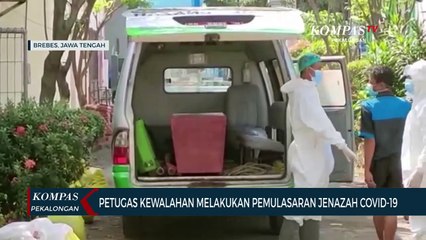 Video herunterladen: Petugas Kewalahan Melakukan Pemulasaran Jenazah Covid-19