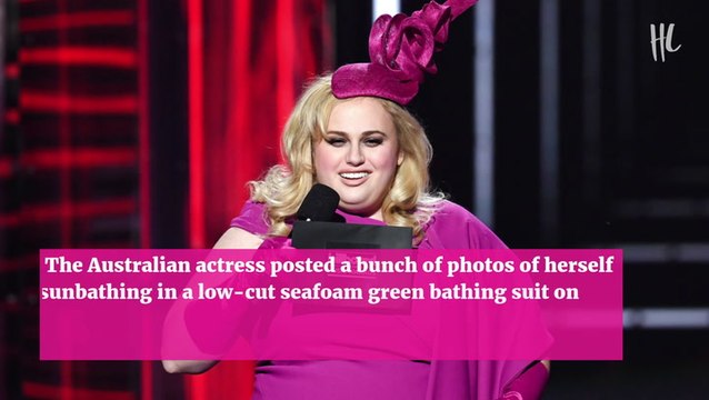 Rebel Wilson Sunbathes In A Low-Cut Swimsuit & Her Ex Jacob Busch Is Here For It