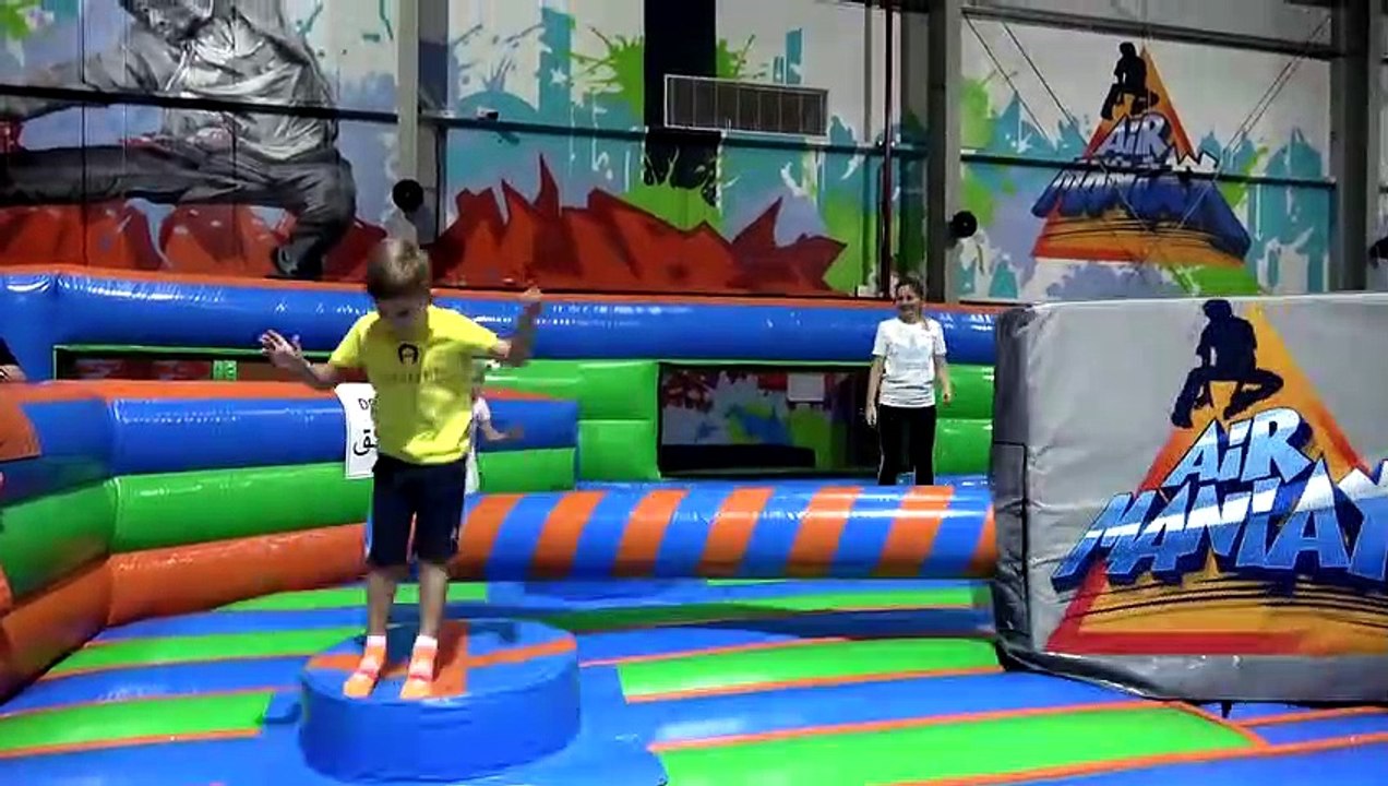 Diana and Roma have fun with Mom on the Playground