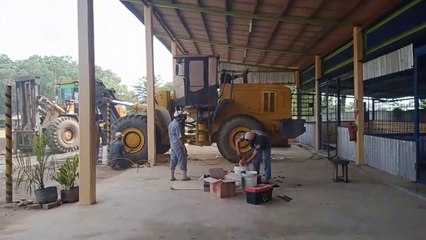 Rekondisi cat body whell loader