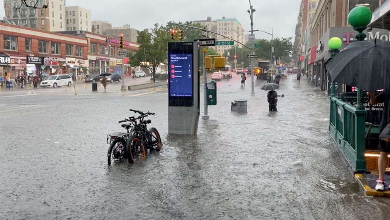 Watch footage of heavy rain flooding subway stations and highways in New York City