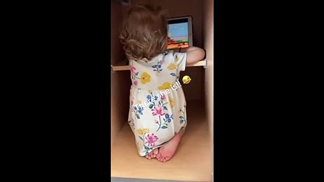 Toddler hides in kitchen cabinet to watch movie #Shorts