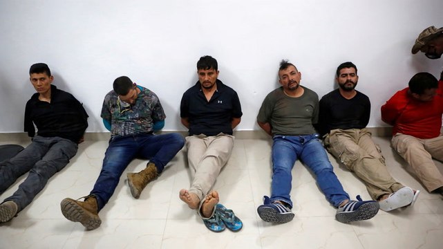 VIDEO: Suspects in the assassination of the Haitian president get marched to jail