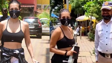 ट्रैफिक पुलिस वाले के साथ स्पोर्ट्स ब्रा में मलाइका अरोड़ा की फोटो वायरल, ट्रोलर्स ने कहा बुरा भला