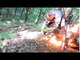 Dirt Bike Bursts Into Flames While Trail Riding and Bikers Extinguish it by Throwing Dirt at it