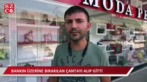 Önce keşif yaptı, sonra bankın üzerine bırakılan çantayı alıp gitti