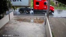 Speeding Truck Tips Over on Slippery Road