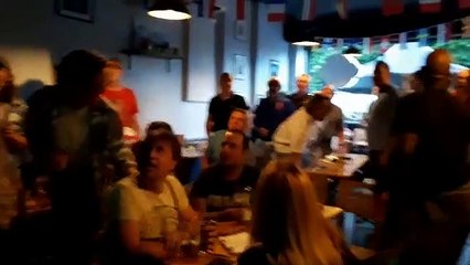 Fans celebrate England's first goal at Two Thirds Beer Co in Sheffield.