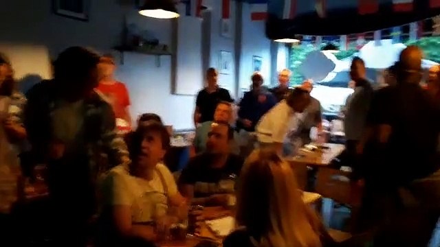 Fans celebrate England's first goal at Two Thirds Beer Co in Sheffield.