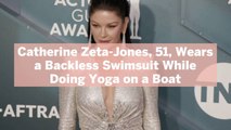 Catherine Zeta-Jones, 51, Wears a Backless Swimsuit While Doing Yoga on a Boat