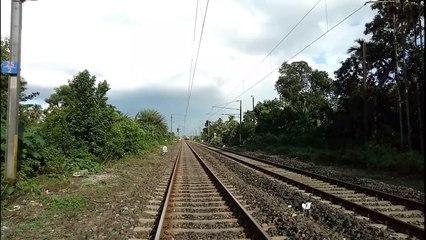 Twin WAP7+WAP5 locomotive leading Howrah-Maldatown Express toward Malda in a beautiful sunny day