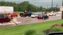 Vehicles stall in midst of severe flash flooding