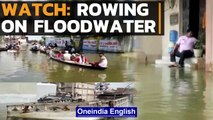 Bihar: People use boats to commute in flooded roads of Muzaffarpur | Watch | Oneindia News
