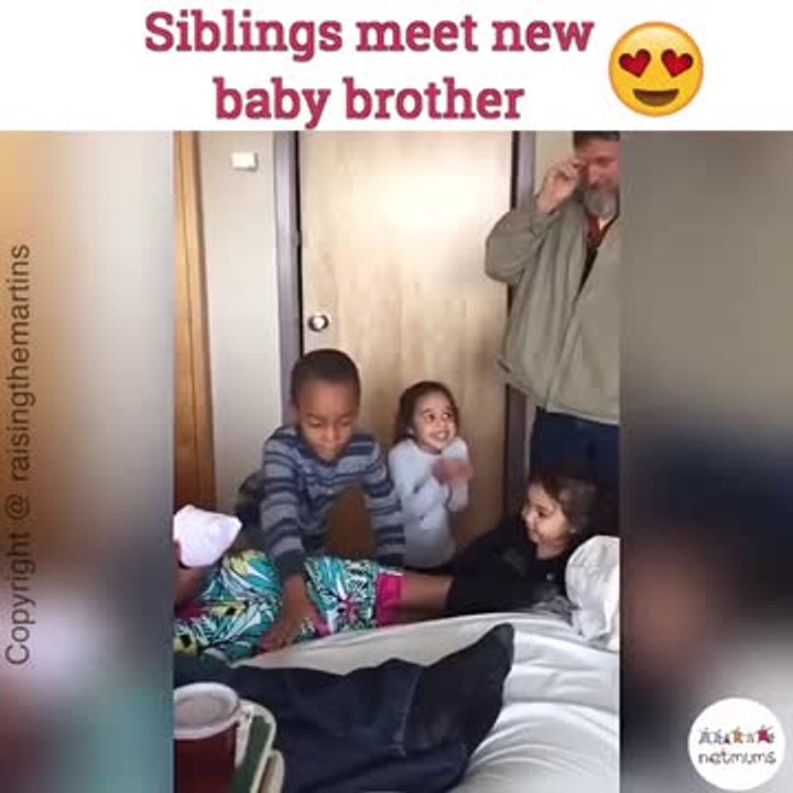 Siblings meet new baby brother