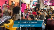 En chelería de Tepito, mujer baila sobre la mesa y sufre brutal caída