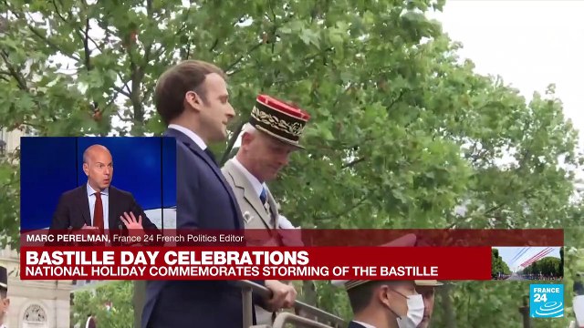 Emmanuel Macron arrives at the Champs Elysees for France's Bastille Day celebrations