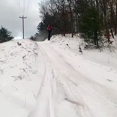 Slow Motion Snowmobile Wipeout