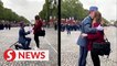 'Marry me?' A Champs Elysees proposal moments before France's July 14 parade