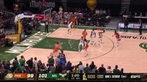 Giannis comes up clutch to deny Ayton