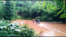 Sullia Locals carry injured woman on stretcher crossing the river no road connectivity since 80 years