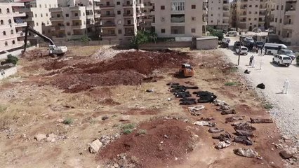 Toplu mezardan çıkarılan ceset sayısı 68'e yükseldi