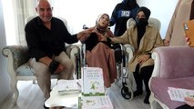 Sultanbeyli'de doğuştan engelli genç kız burnuyla kitap yazarak hayata tutundu