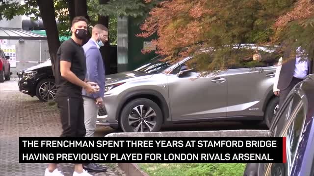 Olivier Giroud completes move to Milan