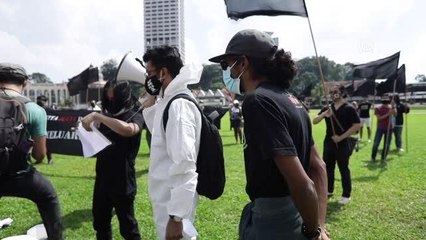 KUALA LUMPUR - Malezya'da hükümetin Kovid-19 politikaları protesto edildi
