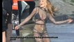 Rita Ora Wears Sheer Dress Over Her Bikini for New Video Shoot