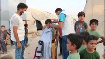 Son dakika haberleri! SSuriye'nin kuzeyindeki Bab'da kamplarda kalan çocuklar bayram tıraşı oldu