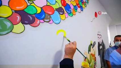 Çocukların korkuyu yenmesi için tüm duvarlara çizgi film karakterleri çizildi