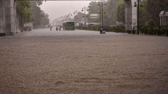 SAD leaders takes boat ride on waterlogged roads in Patiala