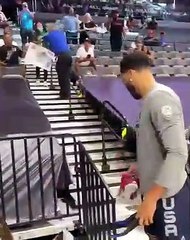 Jayson Tatum gives his game shoes to girl in the stands 