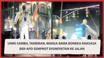 Unik! Sambil Takbiran, Warga Bawa Boneka Raksasa Ber-APD Semprot Disinfektan ke Jalan