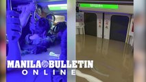 Severe rainstorms kill 12 in flooded China subway